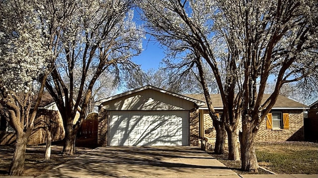 garage featuring driveway