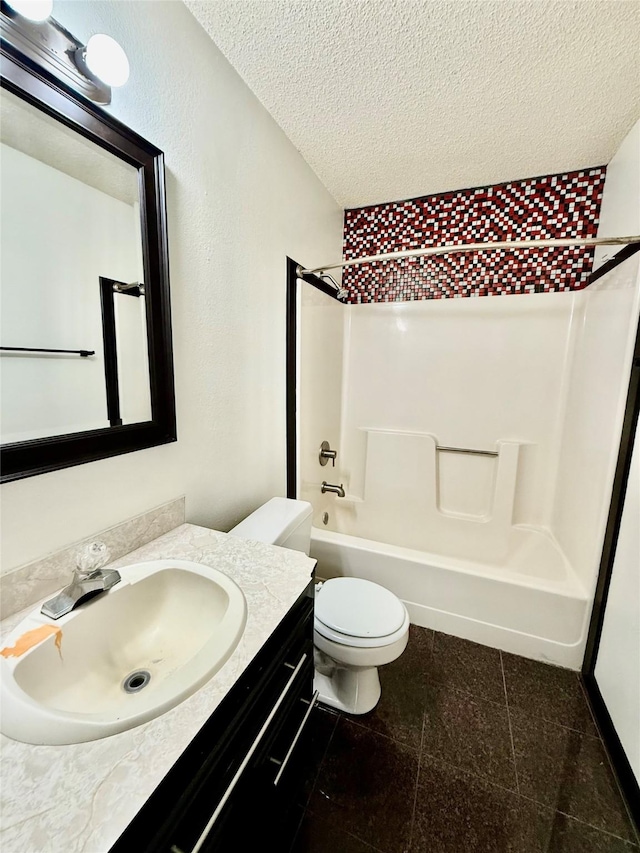 full bathroom with shower / bath combination, a textured ceiling, vanity, and toilet