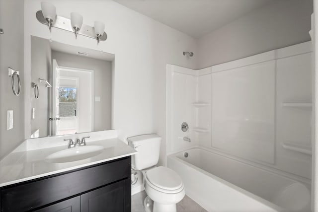 full bath featuring vanity, toilet, and shower / washtub combination