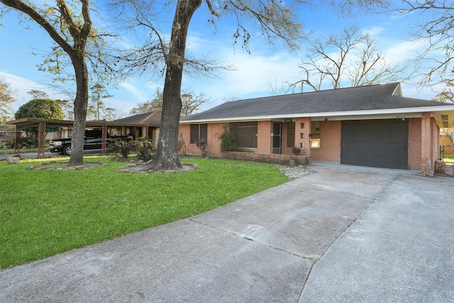 view of front of home featuring brick siding, concrete driveway, a garage, and a front yard