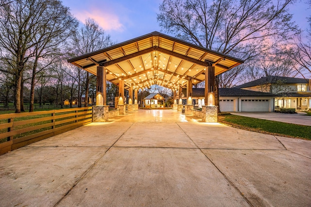 view of community featuring fence