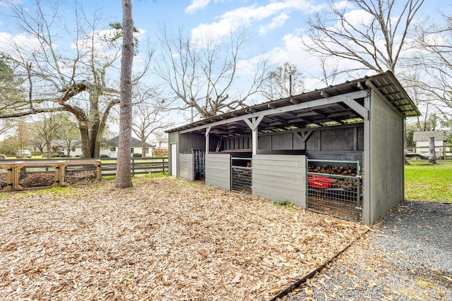 view of outbuilding featuring an exterior structure and an outbuilding