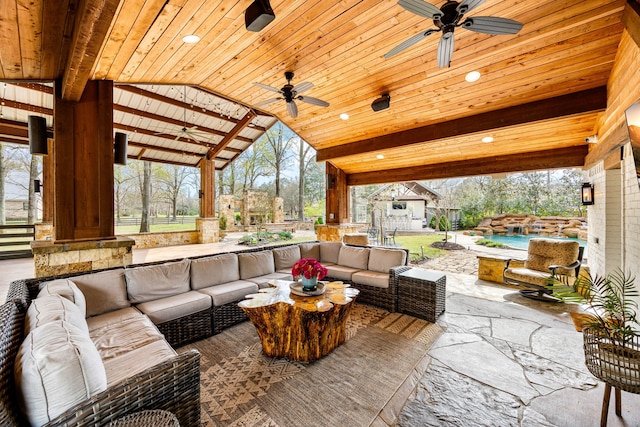 view of patio featuring an outdoor pool, a ceiling fan, and outdoor lounge area