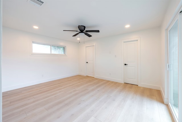 unfurnished room featuring recessed lighting, visible vents, baseboards, and light wood-style flooring