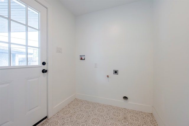 laundry room featuring washer hookup, laundry area, baseboards, and hookup for an electric dryer