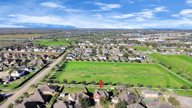 birds eye view of property with a residential view