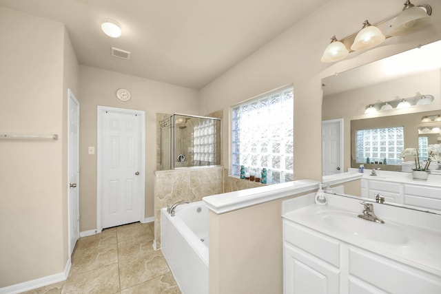 bathroom with vanity, visible vents, baseboards, a stall shower, and a bath