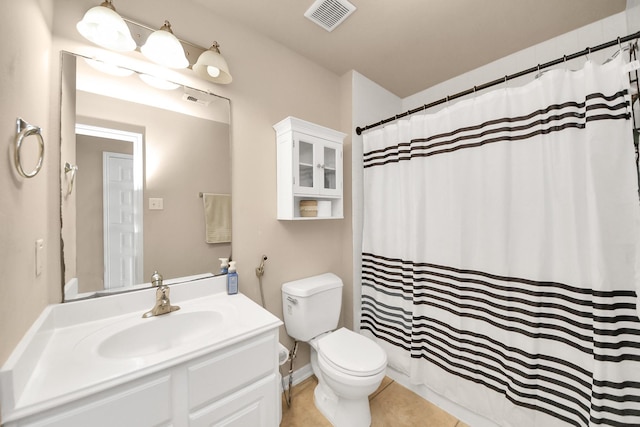 bathroom with visible vents, toilet, vanity, and a shower with curtain