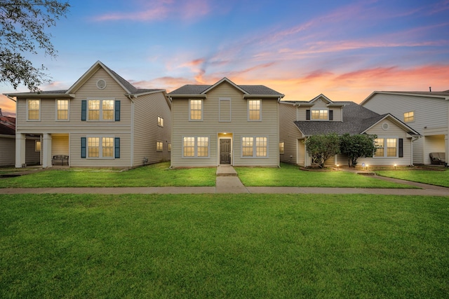 traditional-style home with a yard