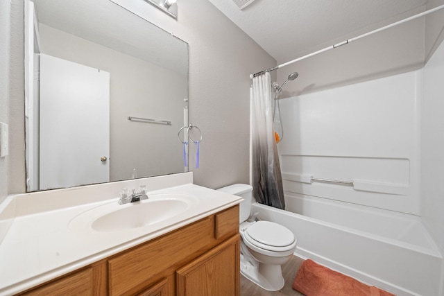 bathroom featuring shower / bath combination with curtain, toilet, and vanity