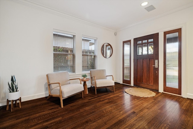 foyer featuring recessed lighting, baseboards, dark wood-type flooring, and crown molding