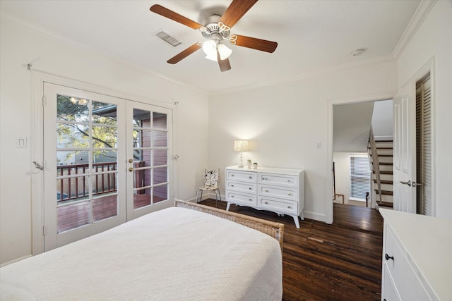 bedroom with access to exterior, visible vents, crown molding, french doors, and dark wood-style floors