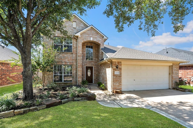 traditional home featuring concrete driveway, a garage, brick siding, and roof with shingles