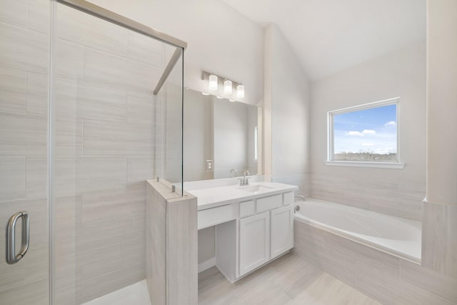 5615 Iris Harvest Dr, Houston, TX 77091 - bathroom with vanity, a stall shower, and a bath