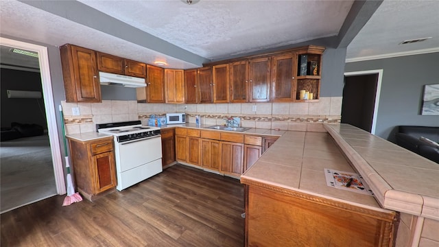 kitchen with white appliances, visible vents, open shelves, dark wood-style flooring, and under cabinet range hood