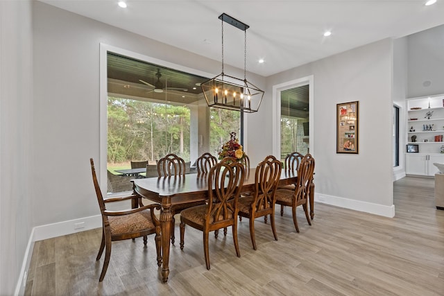 dining area with recessed lighting, baseboards, and light wood-style floors