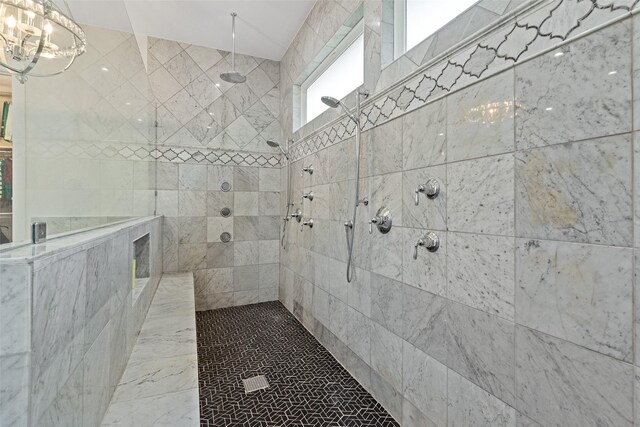 bathroom featuring tiled shower