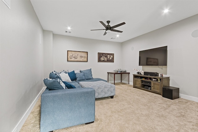 living area with recessed lighting, light colored carpet, and ceiling fan