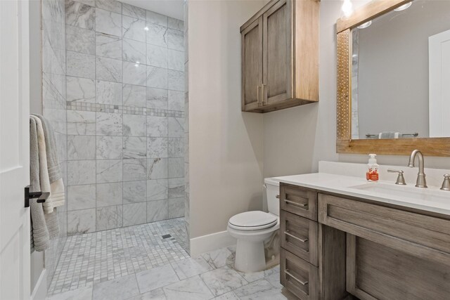 full bath featuring a walk in shower, baseboards, toilet, marble finish floor, and vanity