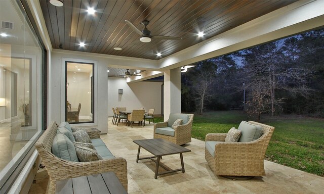 view of patio featuring visible vents, a ceiling fan, outdoor dining space, and outdoor lounge area