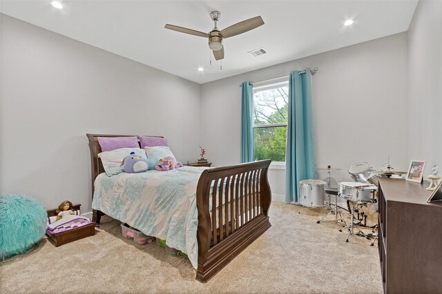 bedroom with a ceiling fan, recessed lighting, light colored carpet, and visible vents