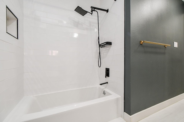 full bathroom featuring baseboards and  shower combination