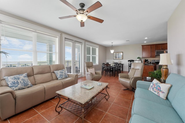 26501 Mangrove Dr Unit 203, Galveston, TX 77554 - living room with tile patterned flooring, a ceiling fan, and recessed lighting