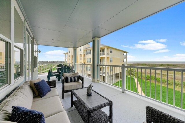 26501 Mangrove Dr Unit 203, Galveston, TX 77554 - balcony with outdoor lounge area