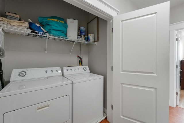 26501 Mangrove Dr Unit 203, Galveston, TX 77554 - laundry room featuring separate washer and dryer