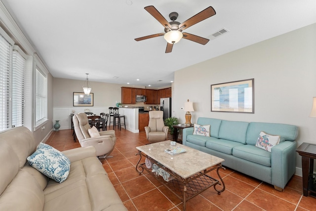 26501 Mangrove Dr Unit 203, Galveston, TX 77554 - living area with tile patterned floors, ceiling fan, and recessed lighting