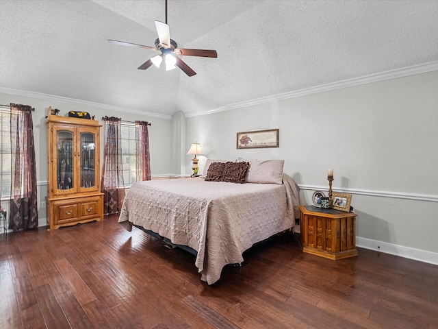 bedroom featuring multiple windows, a textured ceiling, crown molding, and hardwood / wood-style flooring