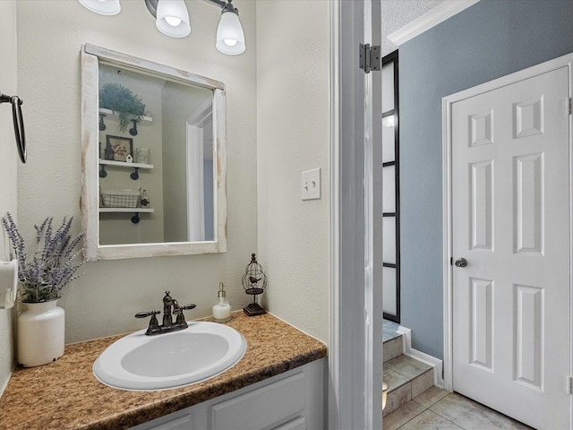 bathroom featuring tile patterned floors and vanity