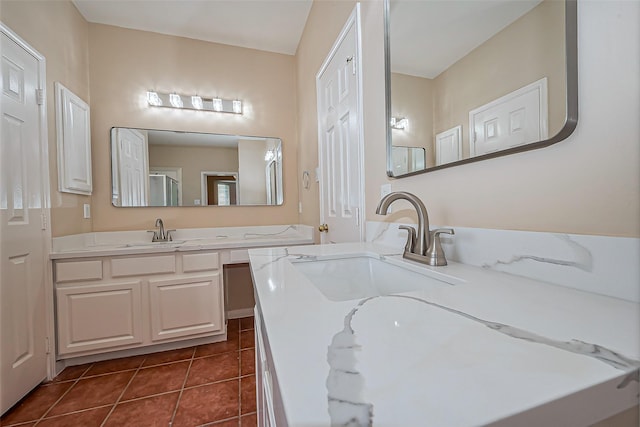 full bathroom featuring vanity and tile patterned floors