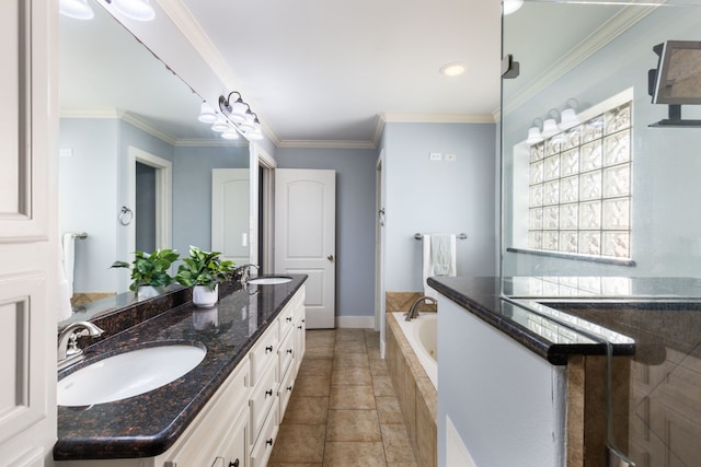 bathroom featuring ornamental molding, a bath, and a sink