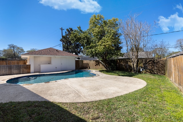 view of pool featuring a patio area, a fenced in pool, a fenced backyard, and a lawn