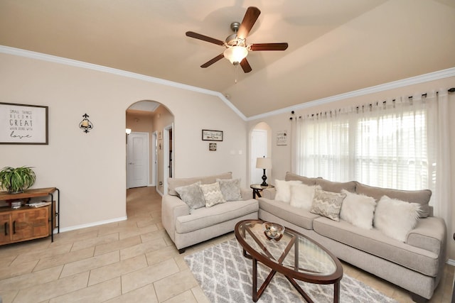 living room with baseboards, ornamental molding, light tile patterned floors, vaulted ceiling, and arched walkways