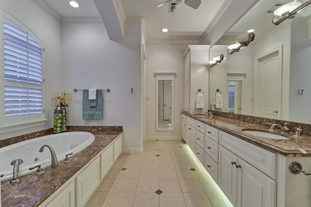 bathroom featuring visible vents, ornamental molding, tile patterned flooring, a sink, and a jetted tub