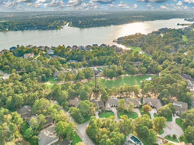 bird's eye view featuring a water view and a residential view