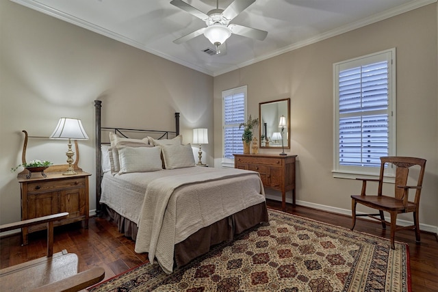 bedroom with baseboards, visible vents, dark wood finished floors, crown molding, and multiple windows