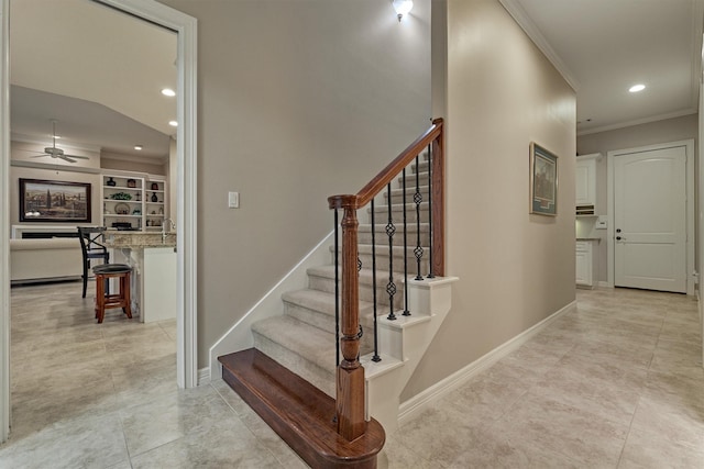 stairway with recessed lighting, ceiling fan, crown molding, and baseboards