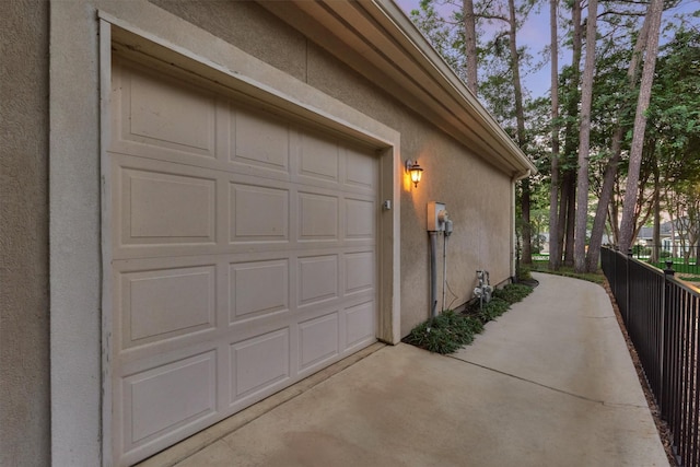 garage featuring driveway