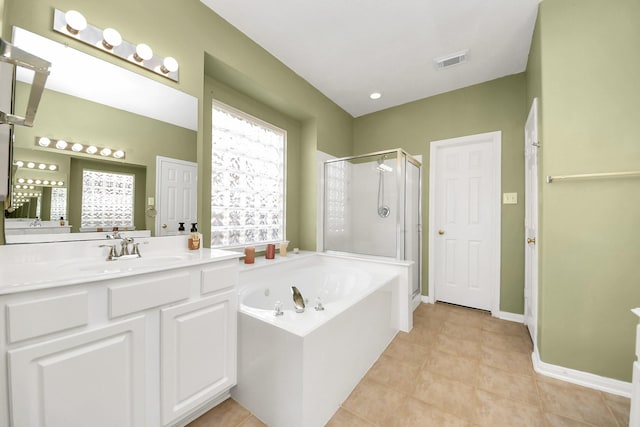 full bath featuring vanity, visible vents, a stall shower, tile patterned flooring, and a garden tub