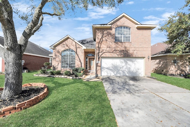 view of front of home with a front yard, brick siding, a garage, and driveway