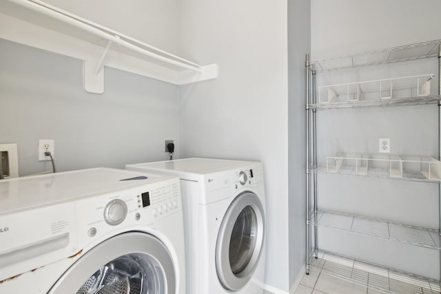 laundry room with washing machine and dryer and laundry area