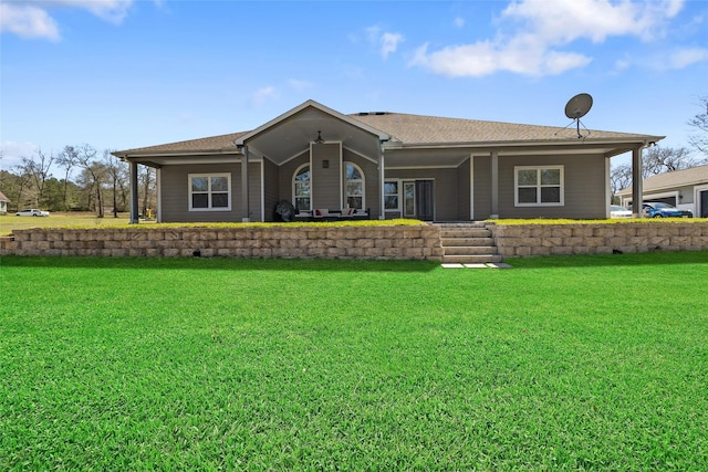 view of front of home featuring a front yard