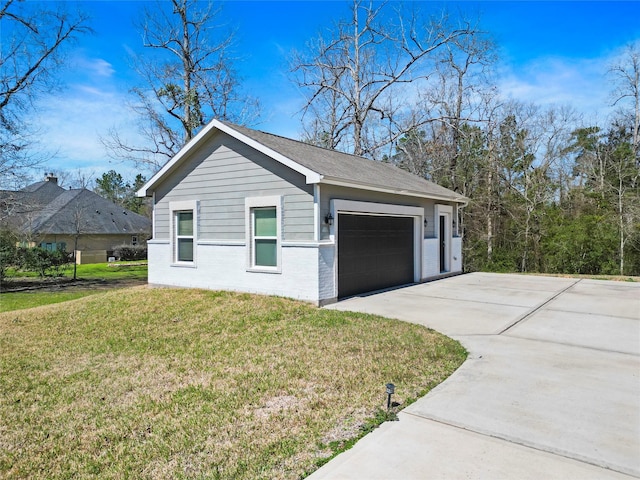 view of side of home with a lawn and brick siding