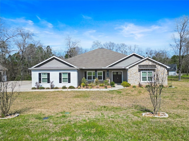 single story home featuring a front yard, stone siding, and roof with shingles