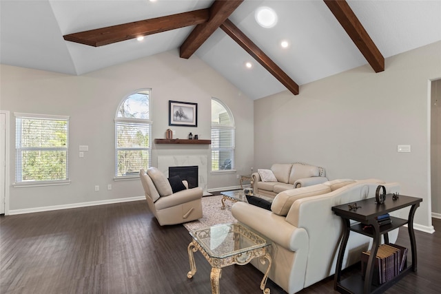 living area featuring baseboards, vaulted ceiling with beams, recessed lighting, a high end fireplace, and dark wood-type flooring