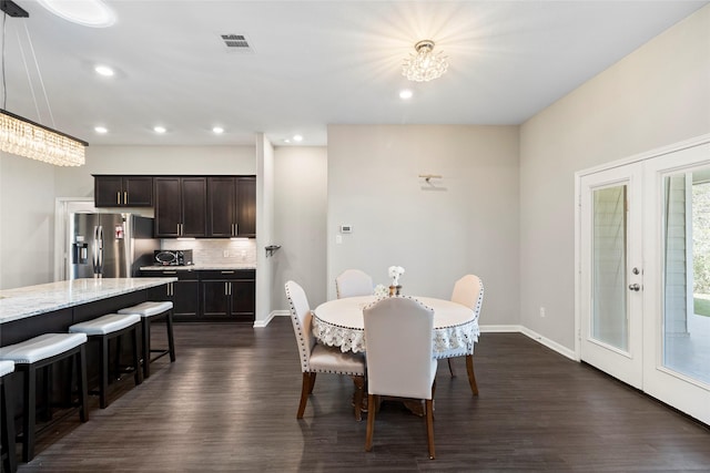 dining area featuring dark wood-style floors, visible vents, baseboards, recessed lighting, and french doors