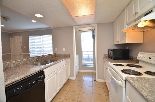 kitchen featuring under cabinet range hood, white cabinetry, black appliances, and a sink